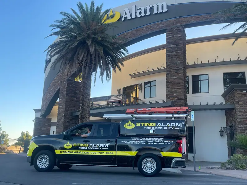 Sting Alarm Fire and Security service truck in front of the Sting Alarm headquarters building in Las Vegas
